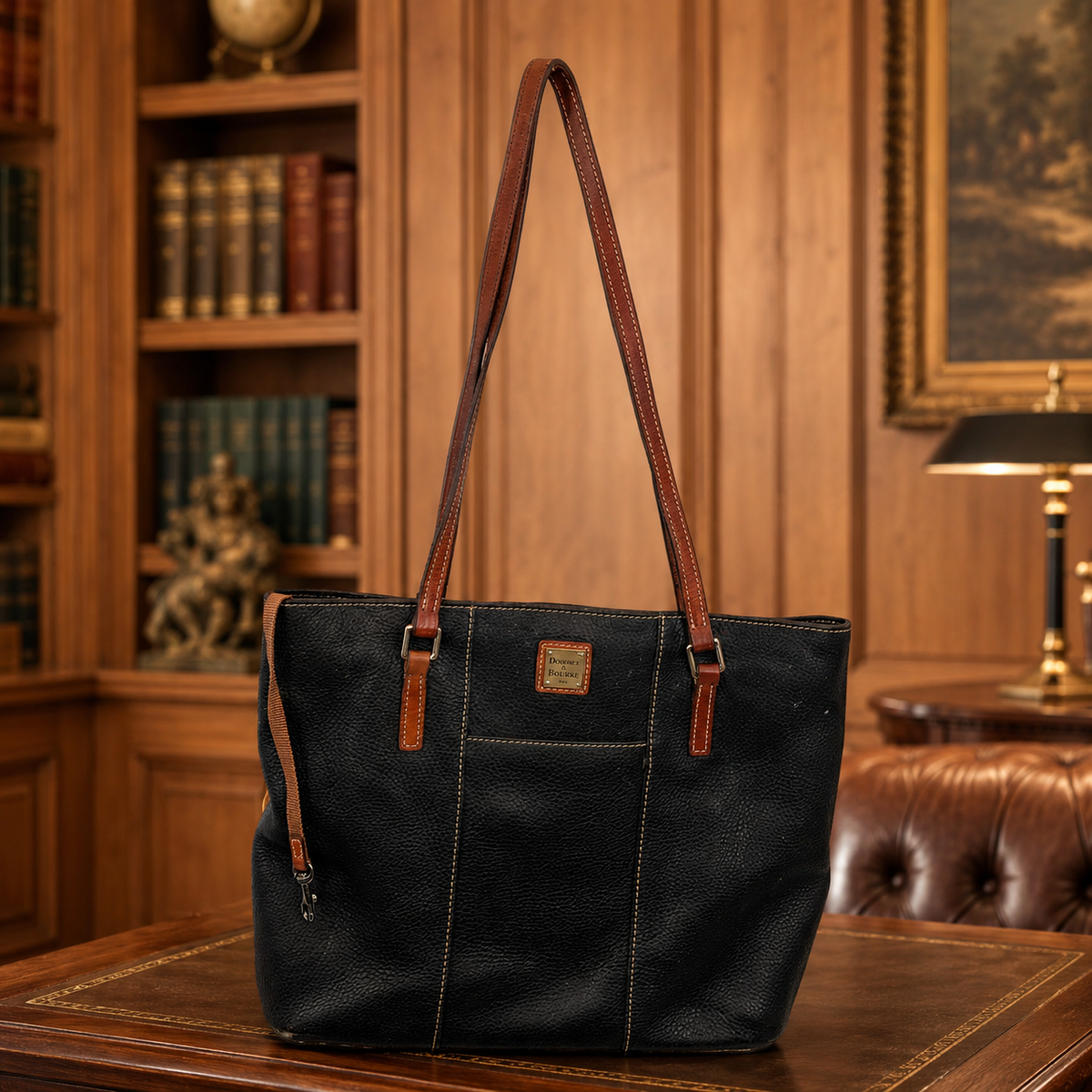 Dooney and Bourke black Lexington shopper tote with brown leather trim