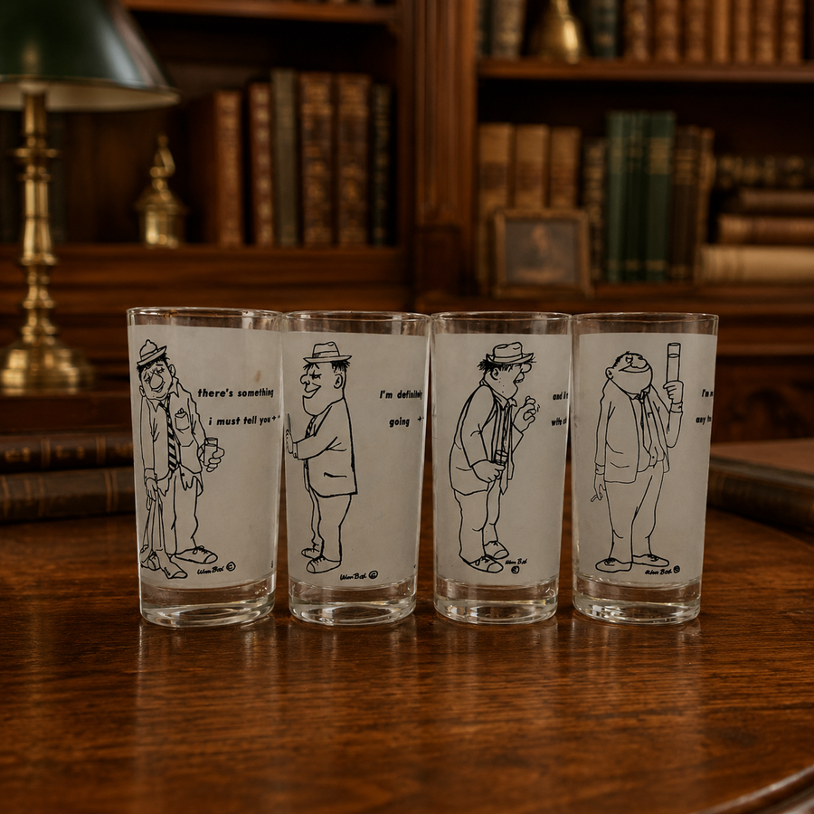 Four clear highball glasses with frosted white panels printed with black cartoon gentleman, signed Wm Box
