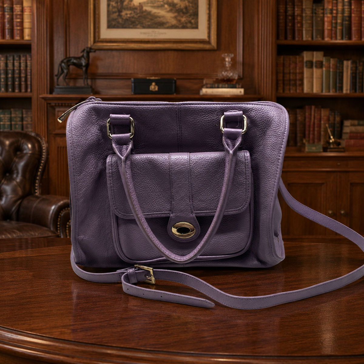 Ora Delphine purple pebbled leather satchel with crossbody strap and gold hardware