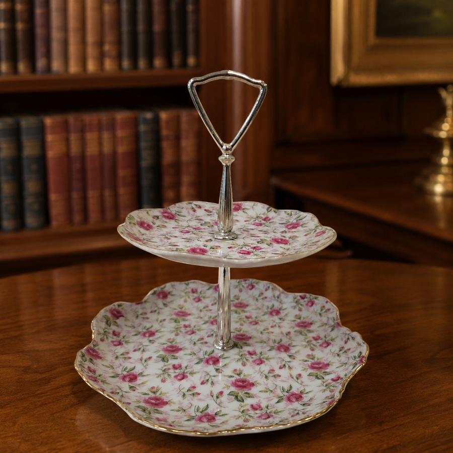 Lefton two-tier serving stand with scalloped pink rose porcelain plates, gold trim and silver-tone handle