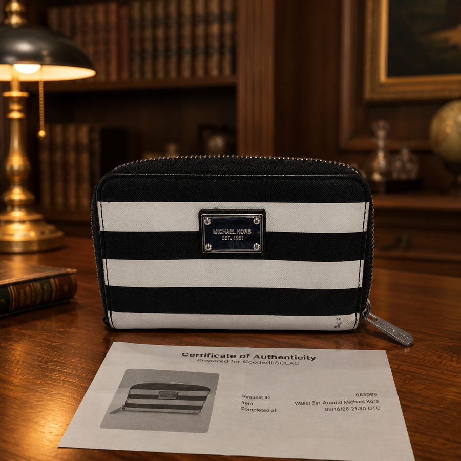 Michael Kors black and white striped zip-around wallet