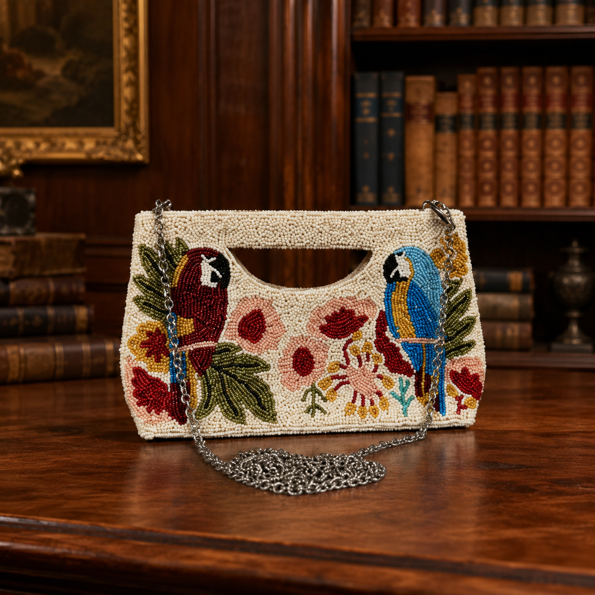 White beaded satchel with colorful parrot and tropical floral beadwork and chain strap