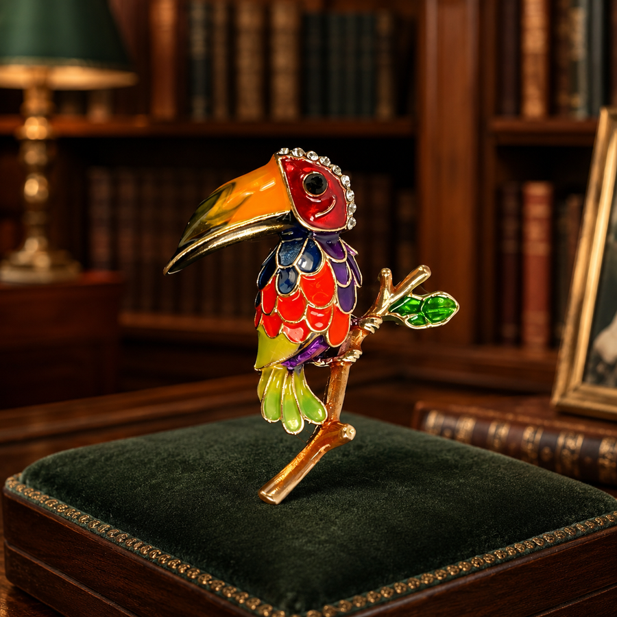Gold-tone toucan pendant brooch with colorful enamel and glass gems