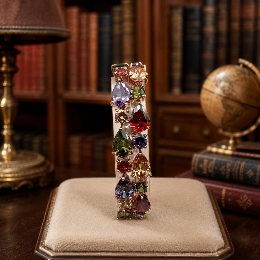 Rose gold-tone bracelet with purple, red, olive green and amber faux gemstones
