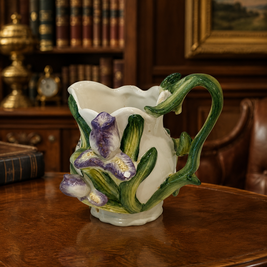 Kaldun and Bogle white ceramic creamer with raised iris flowers and green leaves