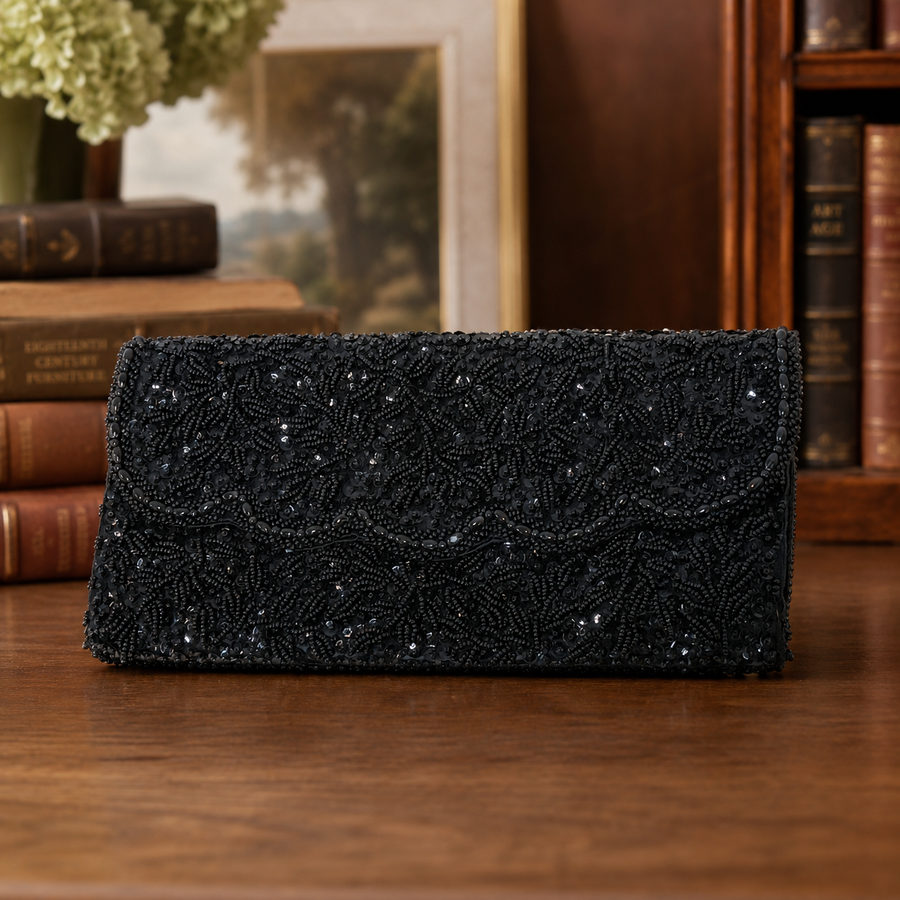 Black allover beaded evening clutch with kiss-lock frame