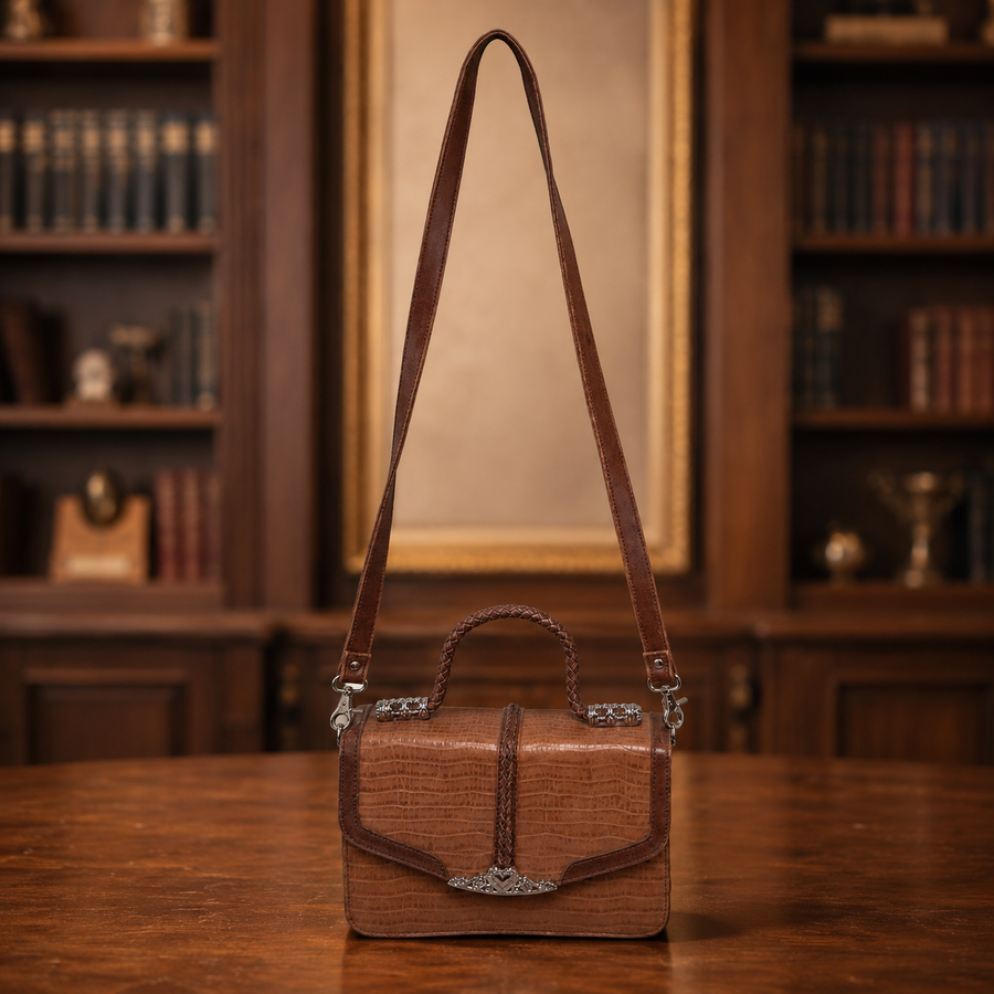 Brown embossed faux leather flap handbag with braided front detail and heart accent