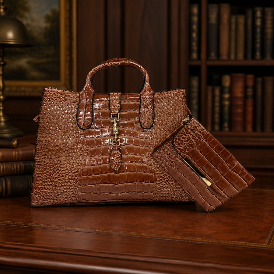 Glossy cognac brown croc embossed satchel with matching wristlet pouch and strap