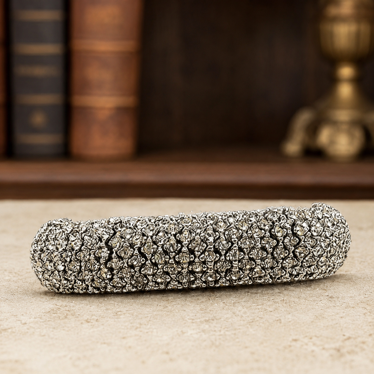 Wide silver-tone panel link bracelet with white rhinestone clusters