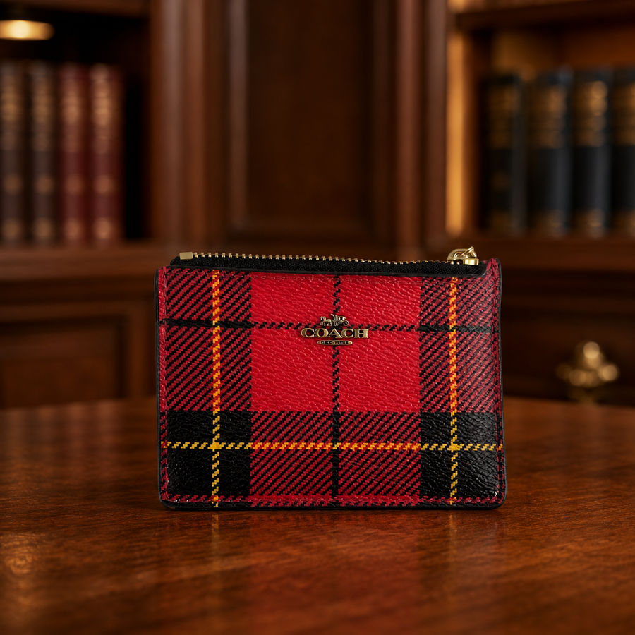 Coach red, black and tan tartan coin purse with black trim and ID window