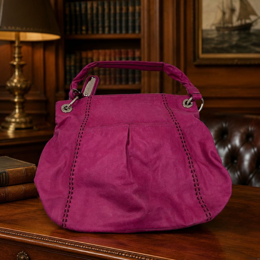 Bright pink leather slouchy hobo shoulder bag with silver-tone hardware and leopard lining