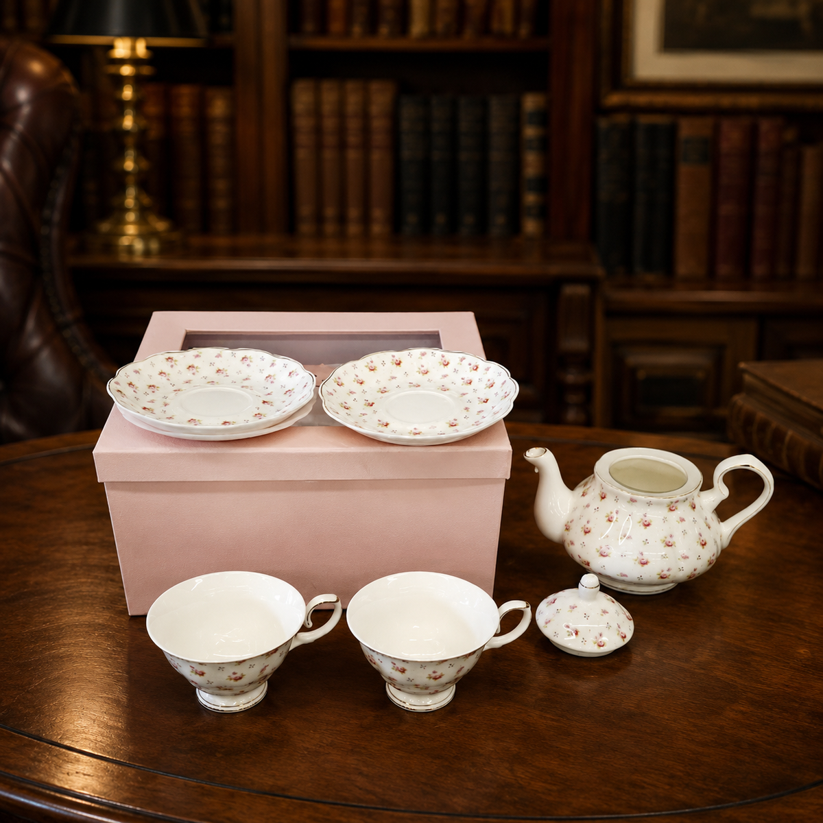 Small ivory porcelain floral tea set with teapot, cups, saucers and original box