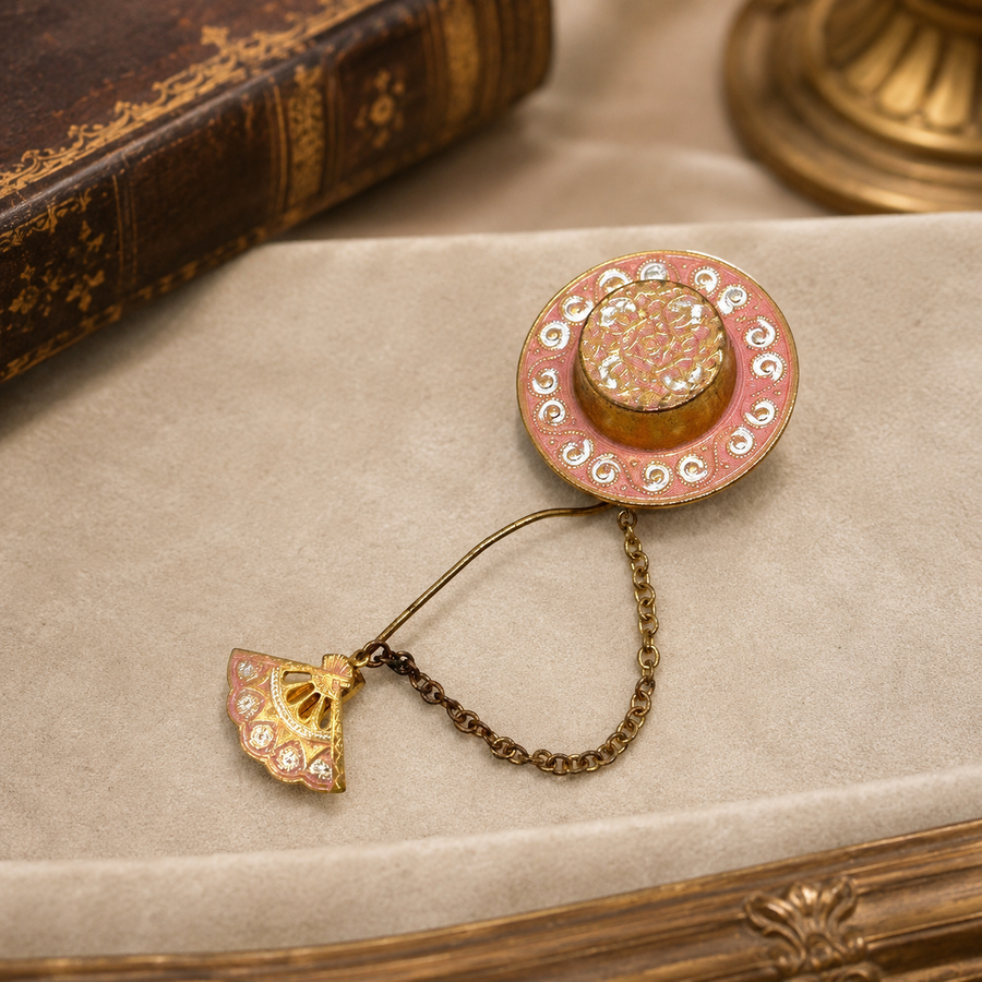Gold-tone stick pin with painted enamel hat and fan charms on chain