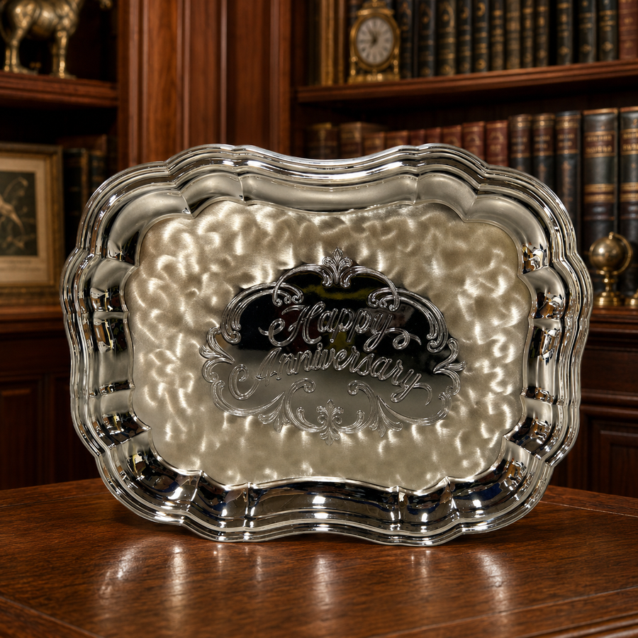 Silver-colored WMF Ikora scalloped serving plate with hammered center and raised Happy Anniversary