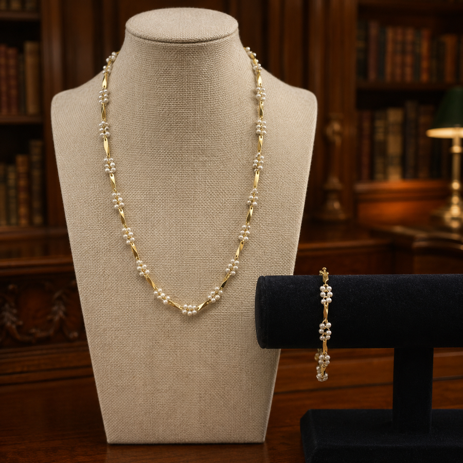 Gold-tone faux pearl station necklace and matching bracelet set