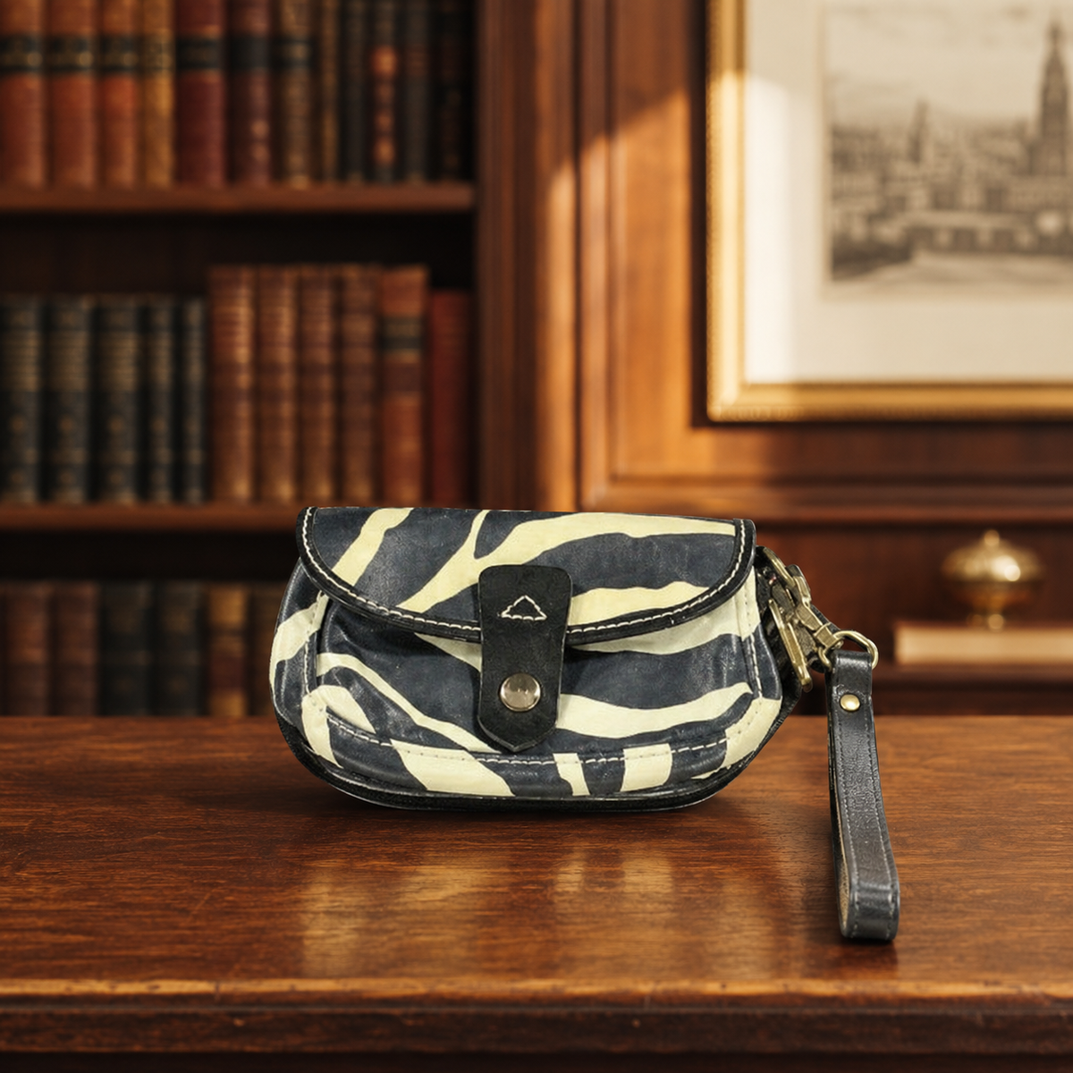 AGE REVIEW Dooney & Bourke Zebra Print Leather Flap Wristlet with Gold Hardware