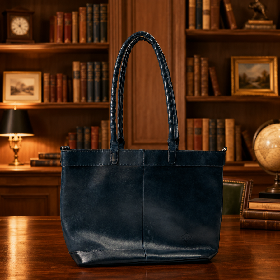 Patricia Nash navy blue leather tote with rolled shoulder straps