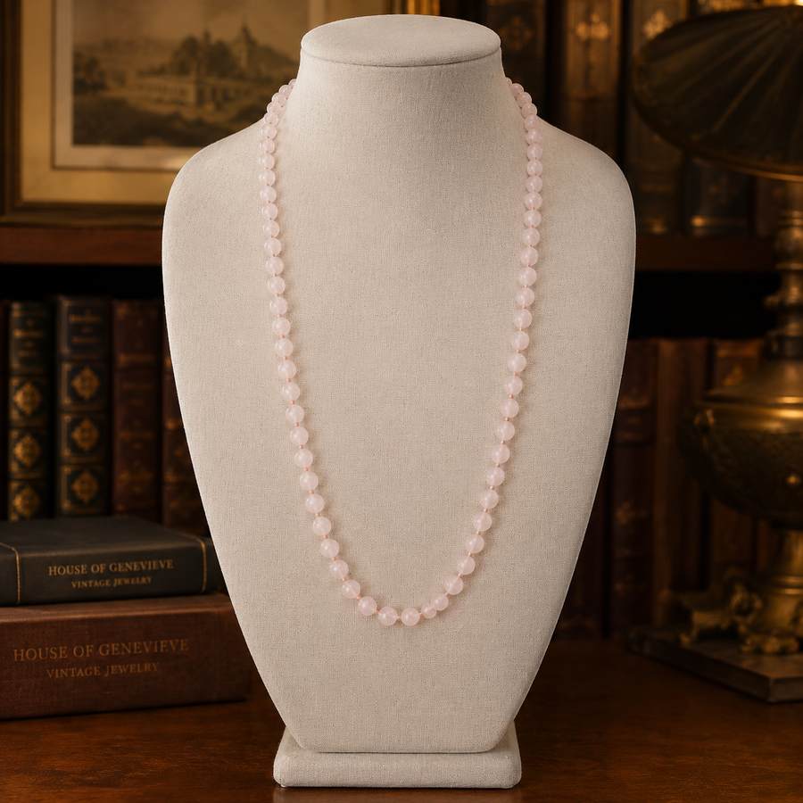 Single strand necklace of pale pink round beads