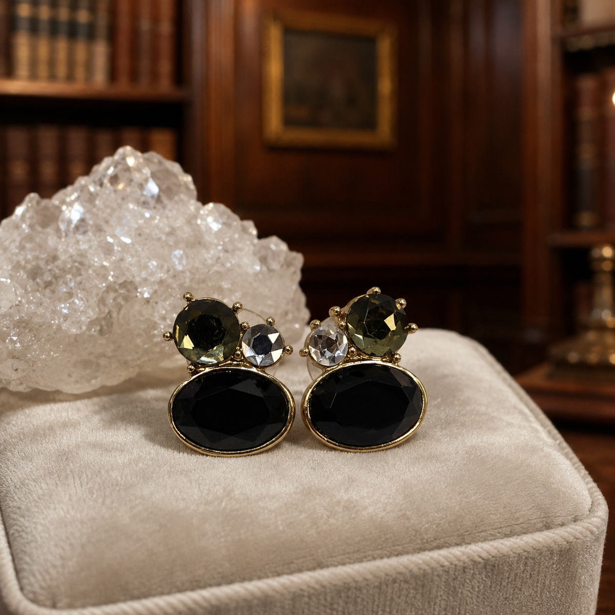 Gold-tone cluster stud earrings with black oval stones and olive green and clear accents