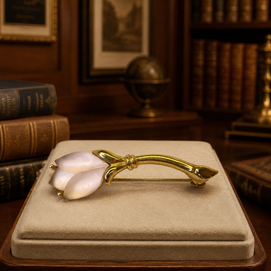 Petite gold-tone flower brooch with two frosted pale pink petals and slender leaf