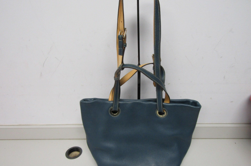 Dooney and Bourke deep teal pebble grain leather tote with strap buckles, view 6