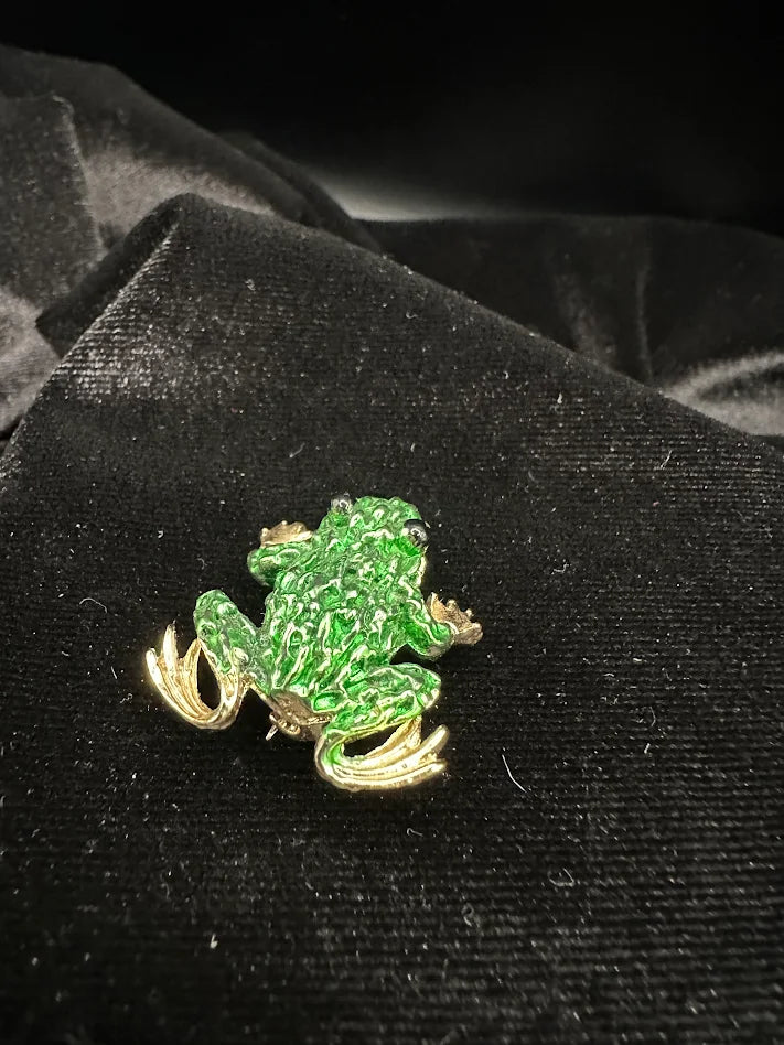(SWAROVSKI) Gold tone green enamel frog brooch with black eyes
