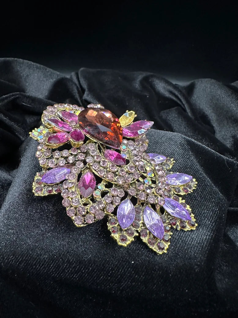Large gold-tone floral brooch with pear-shaped purple center and pink, violet and aurora stones, view 4