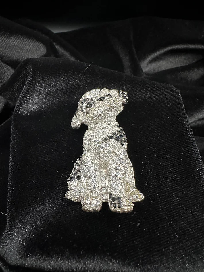 (SWAROVSKY) Silver tone dog brooch with clear and black crystals