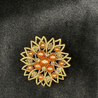 Gold-tone sunburst flower brooch with amber-toned faux pearl cluster and rhinestones, view 2