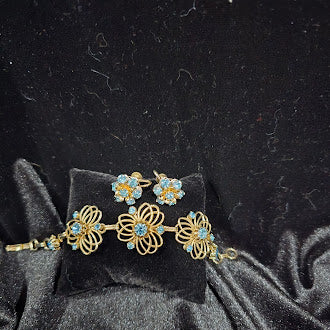 Vintage BSK Gold Tone Blue Rhinestone Bracelet and Clip Earrings Set with Floral Filigree Links, Mid Century Glam, Curated Estate Style