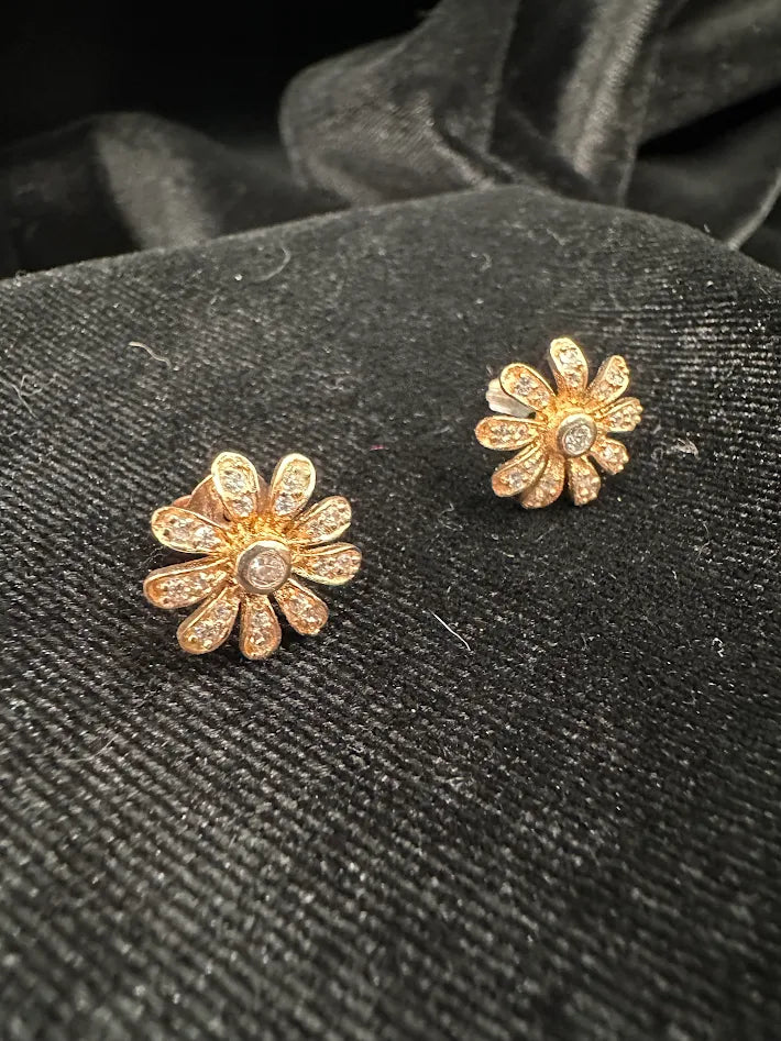 Petite gold-tone flower stud earrings with clear crystal petals and larger center crystal, view 4