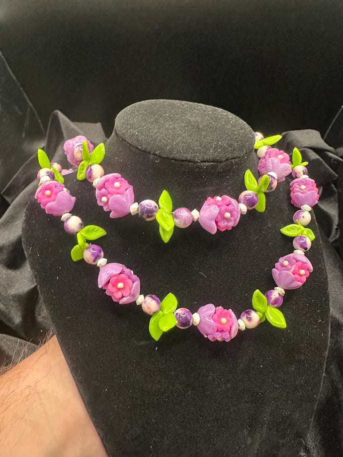 Pink and Purple Flower Bead Necklace with Green Leaf Accents  Description