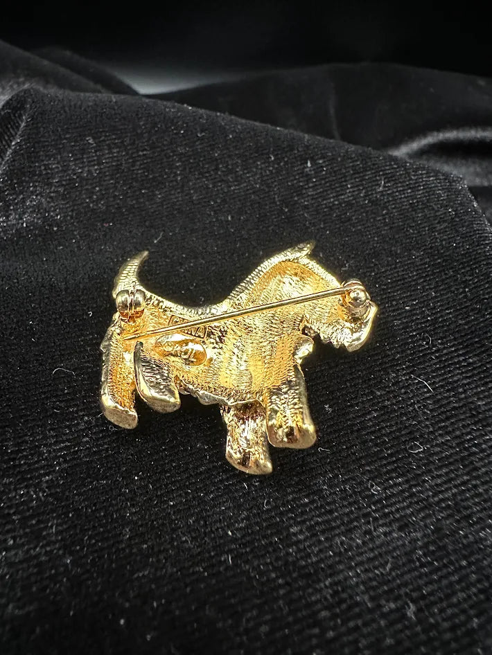 (SIGNED?) Gold tone terrier brooch with clear red green and blue crystals