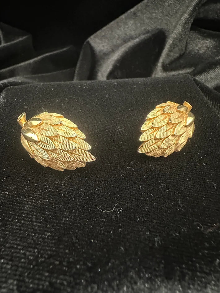 Gold-tone layered leaf clip earrings with rich texture, view 4
