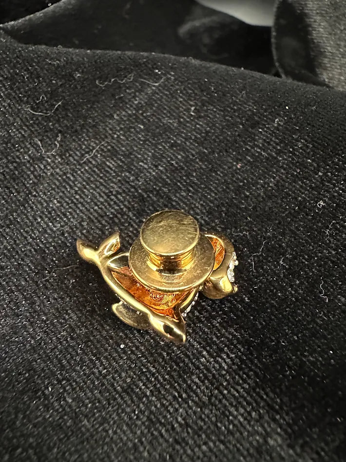 Gold-tone seal brooch with clear pavé crystals and green crystal eye, view 3