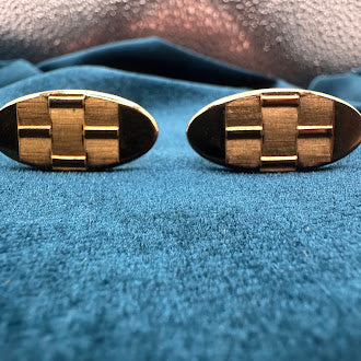 Vintage gold tone oval tie tack set with textured geometric design and chain back