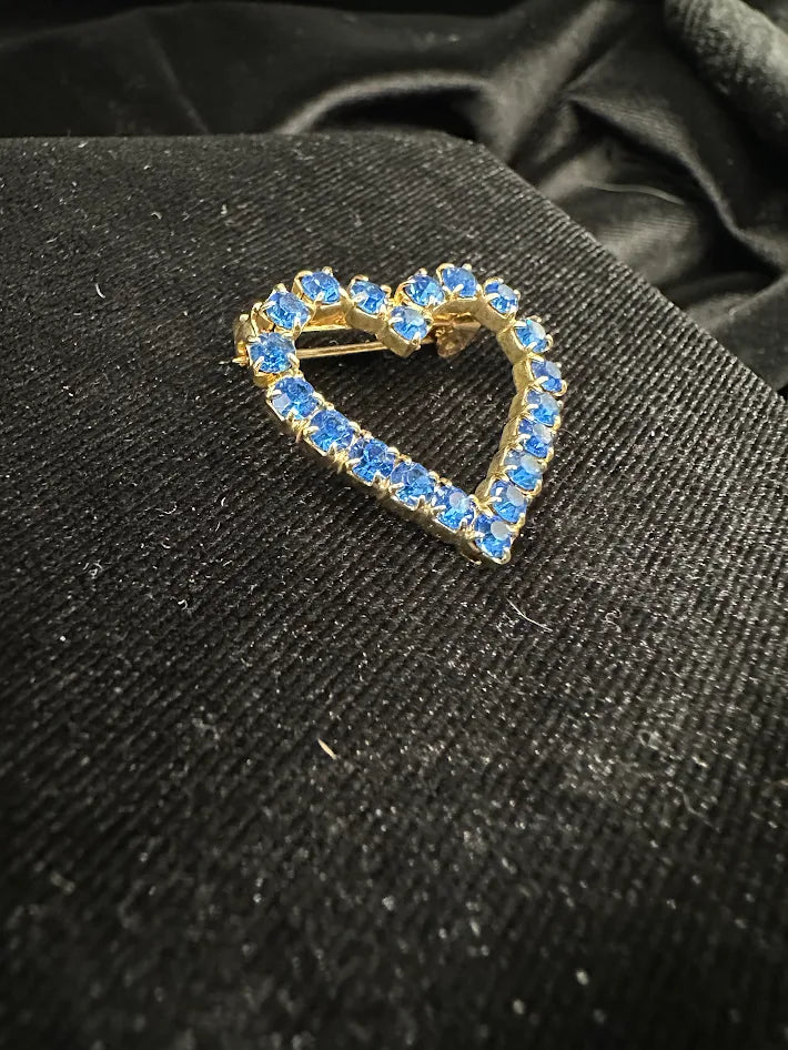 Gold-tone open heart brooch set with blue rhinestones, view 3
