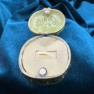 Green enamel ladybug trinket box with floral trim and rhinestone accents, view 6