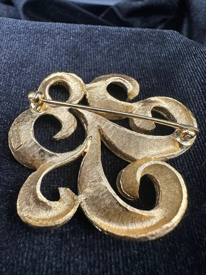 Signed Trifari gold-tone openwork scroll brooch, view 2