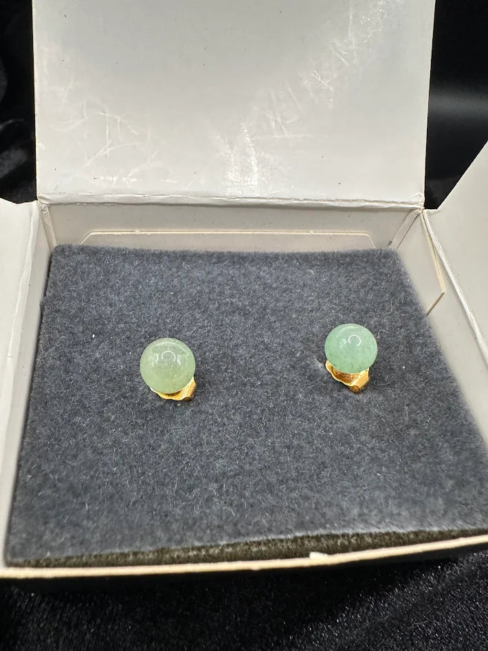 Avon gold-tone stud earrings with round soft green stones in original Avon box, view 2