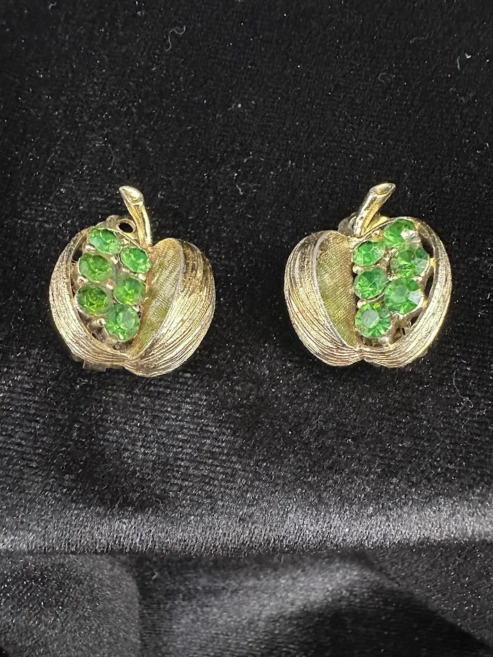 Gold-tone textured basket clip earrings filled with green faceted crystals, view 5