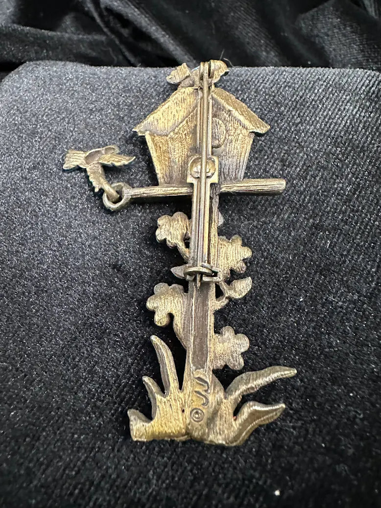 Gold-tone birdhouse brooch with two blue birds, enamel flowers and green leaves, view 3