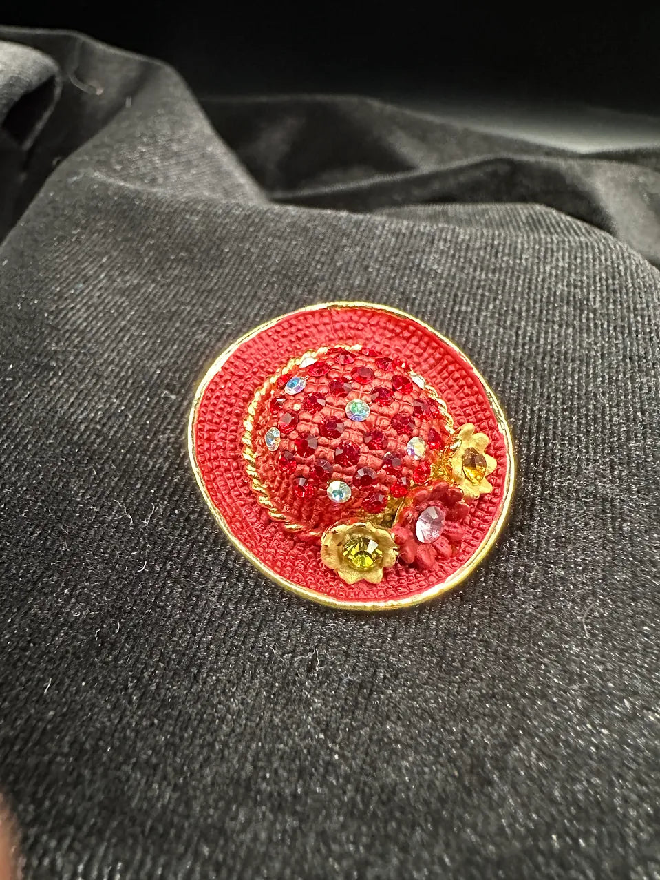 Red crystal wide brim hat brooch with gold-tone edging and small floral details, view 3