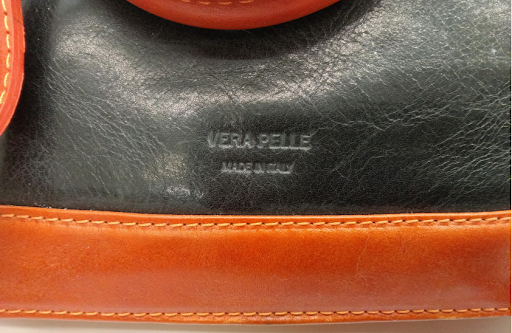 Black leather dome satchel with red contrast trim, top handles and shoulder strap, view 3