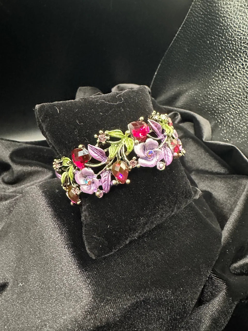 Gold-tone floral bracelet with purple enamel flowers, green leaves and pink crystals, view 2