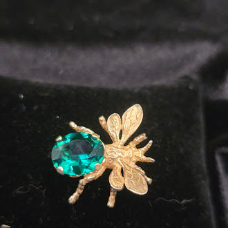 Signed Cini sterling bee brooch with faceted green glass body and engraved wings, view 3