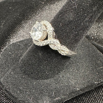 Silver Tone Crystal Solitaire Ring with Twisted Pavé Band
