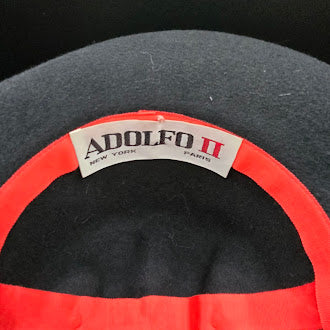 Adolfo II black felt fedora style hat with feather accent