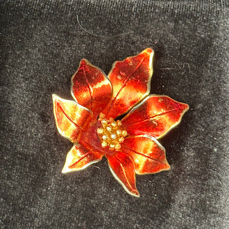 Signed Cerrito gold-tone poinsettia brooch with red enamel petals showing enamel wear, view 2