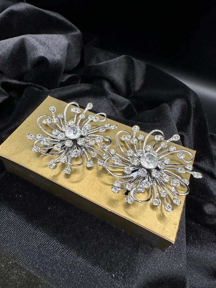 Sarah Coventry silver-tone starburst earrings with clear crystals and original packaging, view 4